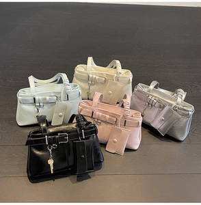 Five assorted retro PU leather handbags with matching mini pouches and key charms
