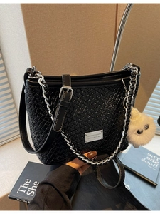 French style woven black leather underarm bag with silver chain and cute eye plush pendant