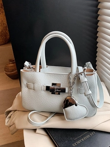 Elegant light blue litchi pattern bucket bag with silver lock and heart charm