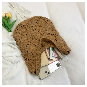 Detail of hand-woven cotton tote bag showing large capacity for phone and cosmetics