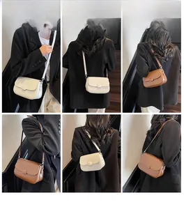Detailed views of minimalist white and brown leather crossbody bags on a model