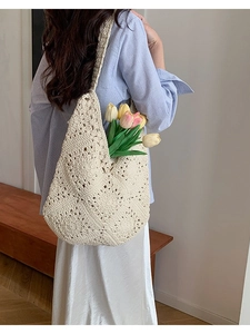 Handmade crochet cotton tote bag with hollow flower patterns and cream finish