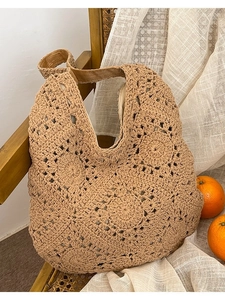 Handmade crochet tote bag featuring floral hollow knit design in khaki cotton thread