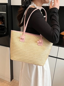 Sac cabas en paille pour femme avec finitions en cuir rose et poignées nouées pour l'été