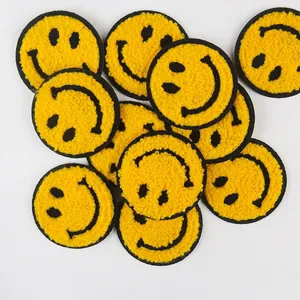 Set of yellow chenille smiley face patches with black embroidery for DIY clothing decor