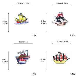 Detail of four colorful nautical ship embroidery patches with precise size dimensions