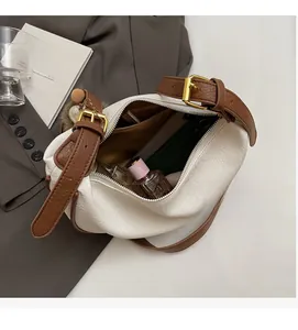 Interior view of white pebbled leather bag showing spacious capacity for daily essentials