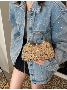 Sparkling gold sequin evening clutch bag with round metal handle and detachable chain