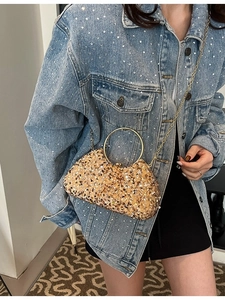 Sparkly gold sequin evening clutch bag with round metal handle and chain strap for women