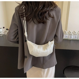 French style white croissant bag with pleated leather and handcrafted knot detail