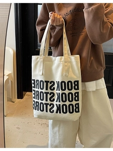 Sac fourre-tout minimaliste en toile blanche avec lettrage Bookstore pour les cours