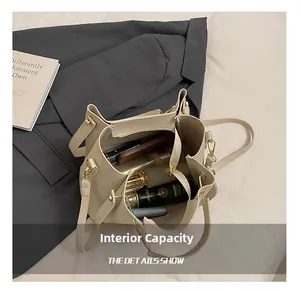 Macro shot of spacious interior capacity for cream lychee texture bucket bag with makeup items