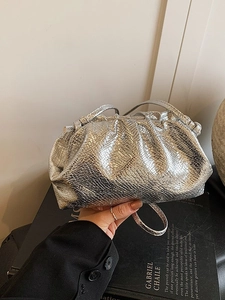 Silver metallic cloud bag with snake texture and pleated design with slim strap