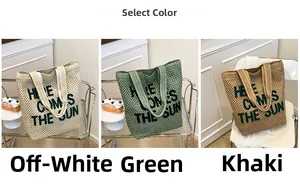 Three embroidered beach tote bags in cream, green and khaki displayed on a chic cart