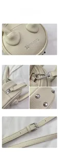 Detail of off-white lychee leather bag showing bunny ears, star print, and silver hardware