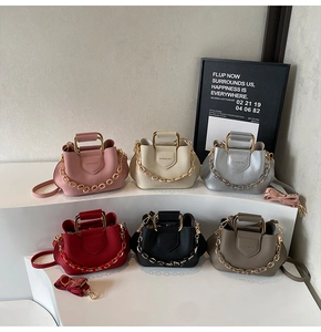 Detailed display of assorted lychee pattern bucket bags in six vibrant colors