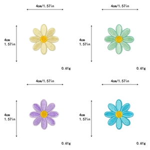 Detailed view of four-color 4cm daisy embroidery patches for DIY clothing decoration