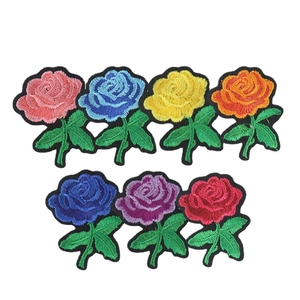 Detailed set of seven colorful rose flower embroidery patches for DIY clothing decoration