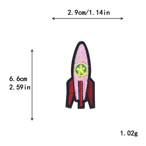 Pink rocket embroidered patch with size dimensions 6.6cm height and 2.9cm width
