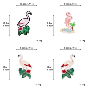 Detailed size chart of pink flamingo embroidery patches with dimensions in cm and inches
