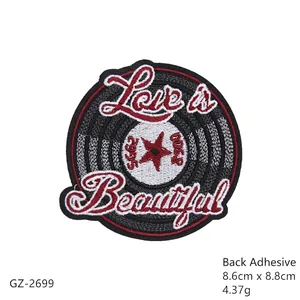 Retro vinyl record embroidered iron-on patch with star design and adhesive backing