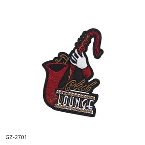 Saxophone embroidered patch with Chill Lounge text and adhesive backing for DIY decor