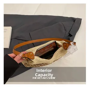 Detail view of woven straw tote bag showing internal capacity for tablets and phones