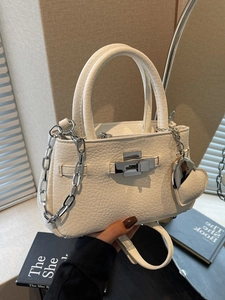 Chic white lychee pattern leather bucket bag with silver chain and heart pendant