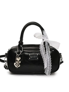 Glossy black bowling handbag with silver heart charm and white lace bow detail