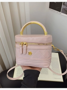Pink quilted box handbag with gold handle and floral clasp for women