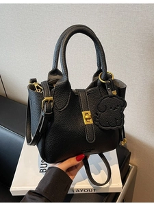 Women's Fashion Minimalist Litchi Grain PU Leather Bucket Bag With Twist Lock And Dog Charm Handheld Crossbody Shoulder Bag For Daily