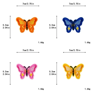 Mesure détaillée montrant la largeur de 7cm et la hauteur de 5,2cm des papillons