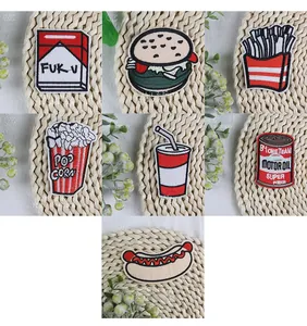 Detailed embroidery patches showing hamburger and fries with exact size and weight specs