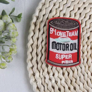 Retro motor oil can embroidered patch with red and white stitching, size 5.3x7.4cm
