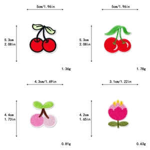 Detailed view of assorted cherry and flower embroidered patches with size and weight metrics