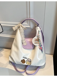 Sac à bandoulière patchwork violet et blanc avec nœud en dentelle et motifs mignons