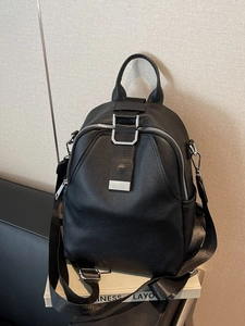 Classic black litchi pattern leather backpack with silver metal buckles and large capacity
