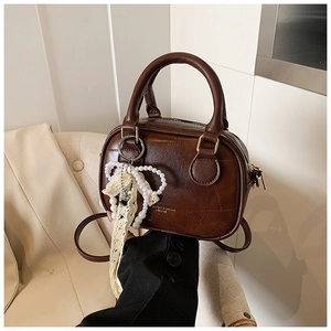 Retro dark brown PU leather Boston bag with elegant pearl and lace bow charm