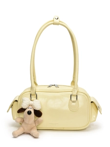 Sac à épaule jaune crème en similicuir avec pendentif chiot peluche et nœud
