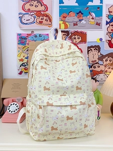 Chic beige canvas backpack featuring cute dog and gift illustrations for school and travel