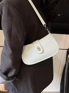 Fashionable mint green baguette shoulder bag with silver metallic turn-lock for women