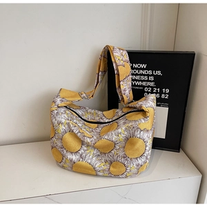 Detail of sunflower canvas tote bag showing the adjustable strap and zipper closure