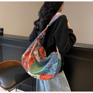 Detail of ethnic style patchwork canvas tote showing vibrant print and large capacity