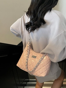 Pale pink quilted patent leather dumpling bag with silver chain strap for women