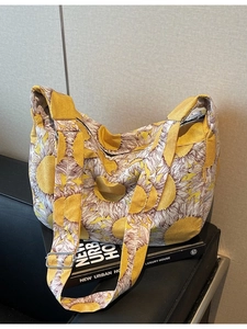 Large yellow sunflower print canvas tote bag with adjustable shoulder strap and spacious interior