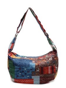 Retro patchwork canvas crossbody bag with colorful patterns and adjustable strap