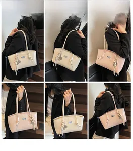 Detail of embossed cartoon character pattern on large capacity beige and pink tote bag