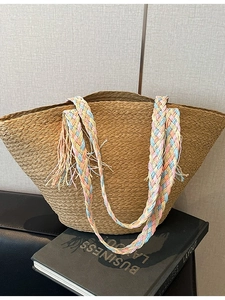 Borsa tote in paglia intrecciata a mano con manici colorati e nappe per la spiaggia