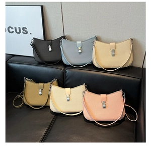 Detailed display of crescent shoulder bags in six colors with metallic silver buckle