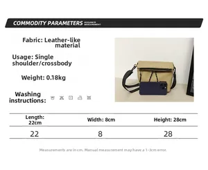 Detail view of khaki nylon crossbody bag featuring waterproof fabric and size parameters